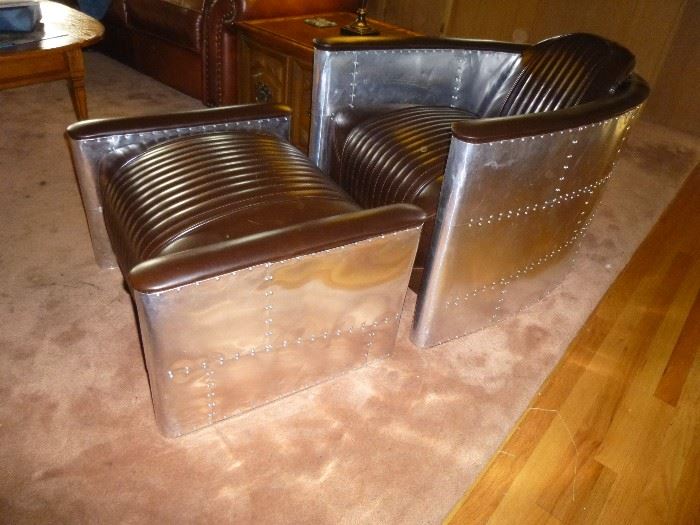 AVIATOR (TOBACCO) CHAIR WITH OTTOMAN, INSPIRED BY FIGHTER PLANES. STAINLESS STEEL CURVES, VERY COOL