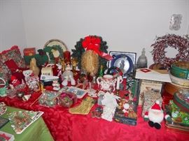 Christmas decorations including a crystal Goebel plate and bell (in back right of wreath with red bow)