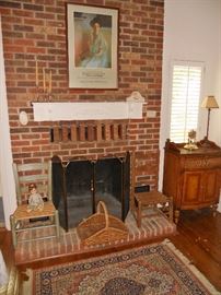 Two old slat back chairs with woven seats--the one on the right is handcrafted