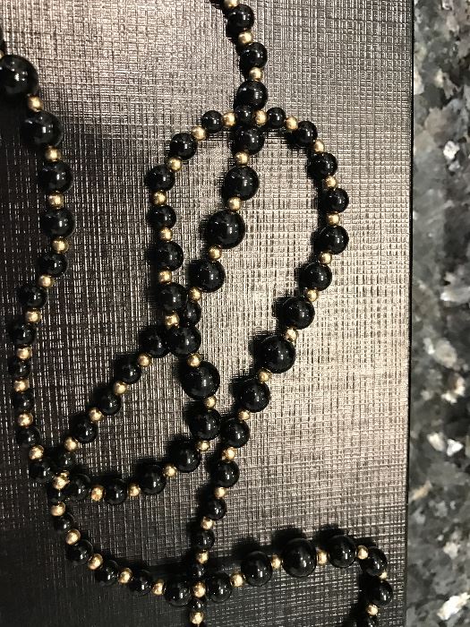 36"Black onyx with gold beads