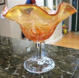 Marigold Carnival glass compote