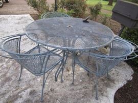 wrought iron patio table with 4 chairs (one not pictured)