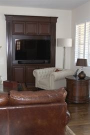 Restoration Hardware Kensington Tufted Chair, Samsung TV, BOWERS AND WILKINS Sound Bar
