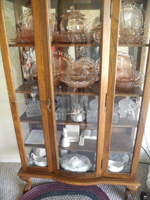 Antique display cabinet with LOTS of pink depression glass!