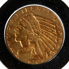1910 Indian Head Five Dollar Gold Coin: A 1910 Indian Head five dollar gold coin. This coin was designed by Bela Lyon Pratt. It has a metal composition of 90% gold, 10% copper, and measures 21.6 mm in diameter with a weight of 8.36 grams.