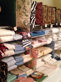 More decorative pillows and many linens