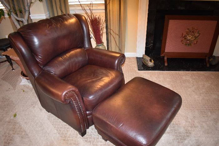 Pair of Leather wingback chairs and one ottoman