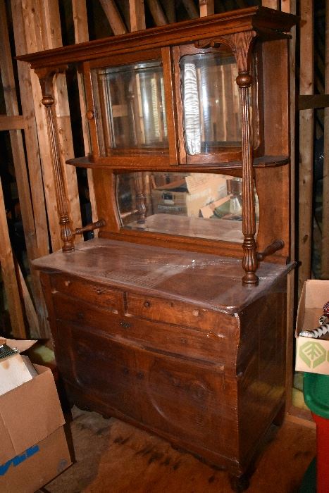 1890's Oak Bowed top glass Server resting on chest cabinet with four turned legs