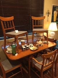 Antique table and 6 chairs (2 captains). Newly reupholstered.