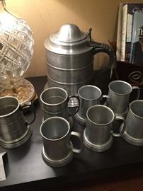 Pewter tankard with set of 7 clear bottom cups