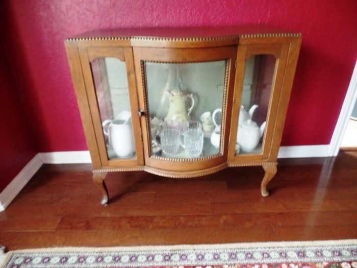 Unique, antique curio cabinet 
