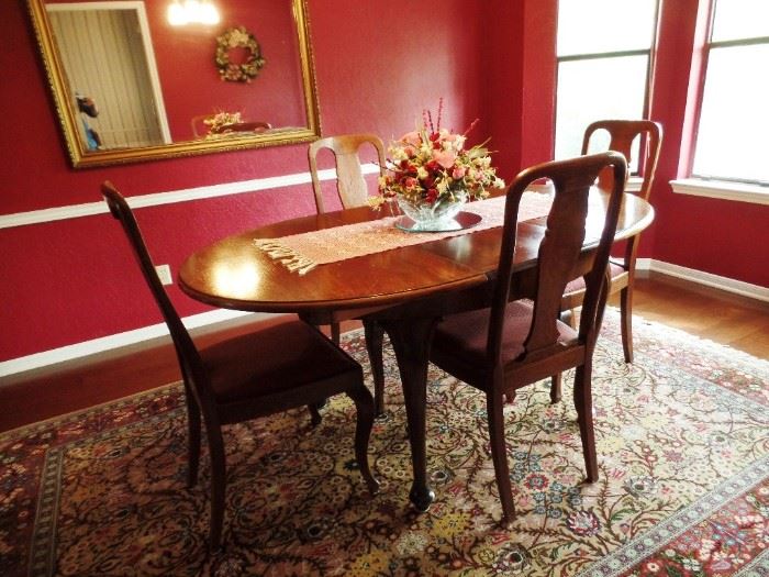 Elegant dining room set with leaves for the table