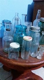 Collection of vintage bottles and jar