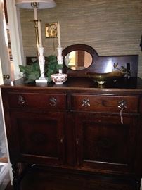 Handsome barley twish buffet with small, low mirror