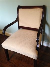 Armed upholstered occasional chair