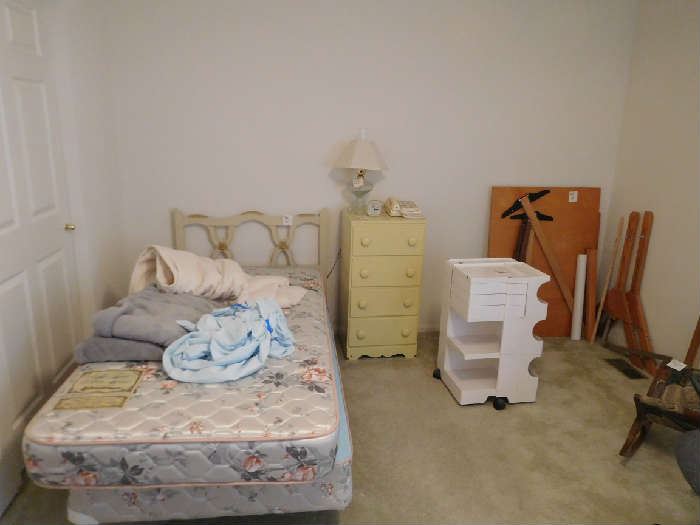 twin  bed  and  linens,small  chest,artists stand