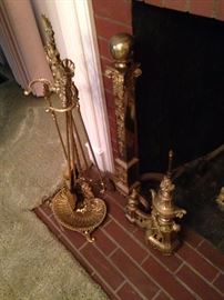 Ornately detailed fireplace tools and andirons purchasesd many years ago from a Dallas antique shop