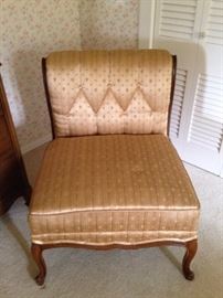 One of two matching bedroom chairs