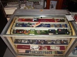 Cameras pocket watches Nintendo Ds games Coins watches  pocket knifes Vintage bottle openers 