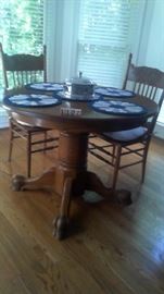 Dining table, oak, claw foot
Dining Chairs, Cane seat, set of 4