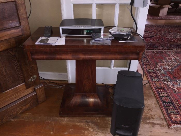 Mahogany game table and Bose CD/DVD player