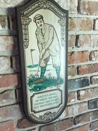 A vintage golfers plaque