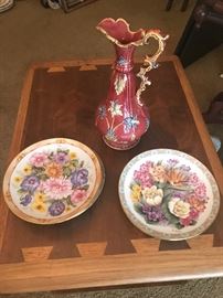 Collectors plates and a majolica style urn