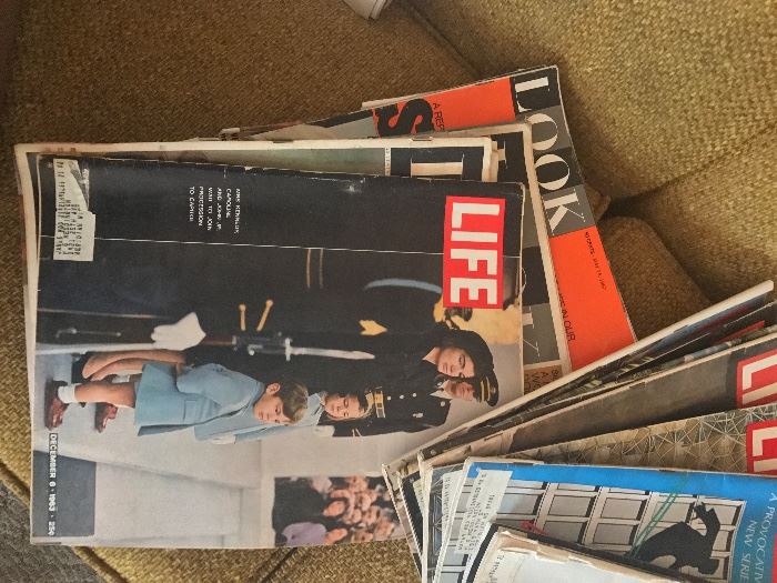 Many magazines on the Kennedy family