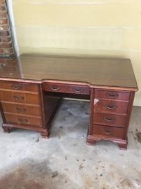 A very nice desk. Impressive and beautiful wood. Just needs a good cleaning and a polish