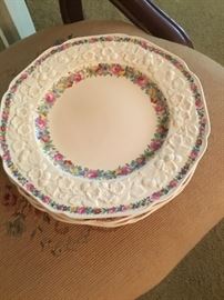 Beautiful old cream colored China with rose border