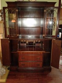 Flame Mahogany drop front Secretary /China cabinet with 2 shelves on top 3 drawers 2 side doors with a shelves 38"wide 15"deep 72"tall $250.00                                                                                                                                                                                                                                                                                                                                                                               