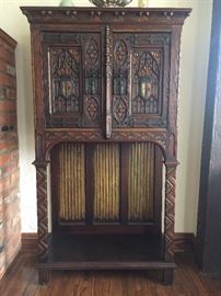 Turn of the Century Cabinet, Carving in Gothic Shapes, Iron Strapwork, Carved Figures, Polychromed