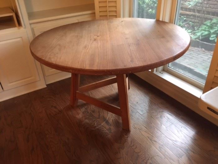 Large round Pine Table with tripod base. 
