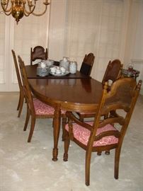 Dining room table, 6 chairs, pads, leaves