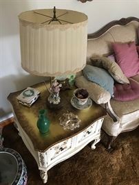 Antique lamps and also eclectic clothing available 