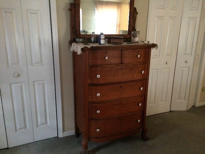 Solid Oak Male Dresser with Lion's feet (original wood knobs included).