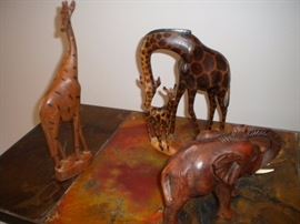 Carved wooden animals- giraffe and elephant