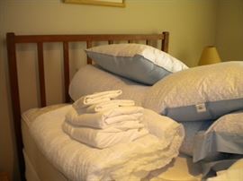 Full size antique mission style bed head/foot board and full mattress. Linens freshly washed
