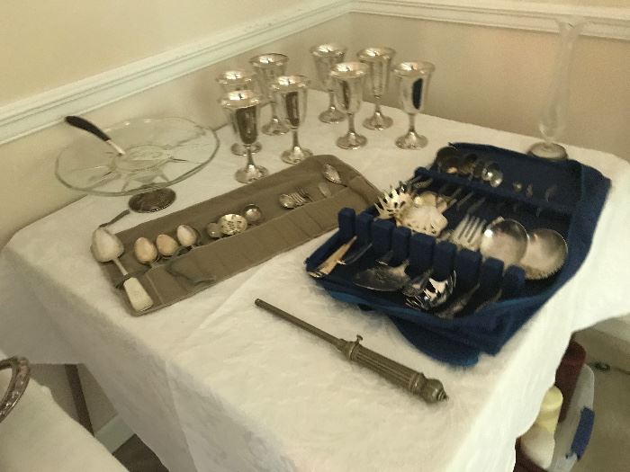 Sterling flatware and glasses