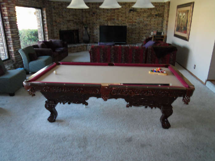 THIS IS A 8' CUSTOM MADE DARK WALNUT MOHAGANY, SLATE POOL TABLE IN PERFECT CONDITION, WITH ROYAL RED FELT BUMPERS, LEATHER POCKETS, AND ITALIAN EAGLE CLAW LEGS, WITH NOT A "SCRATH" ON IT !