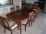 8 SEAT FORMAL DINNING ROOM TABLE AND CHAIRS WITH PADDED SEATS IN GREAT CONDITION, THIS IS A VACATION HOME THAT WAS NEVER USED.