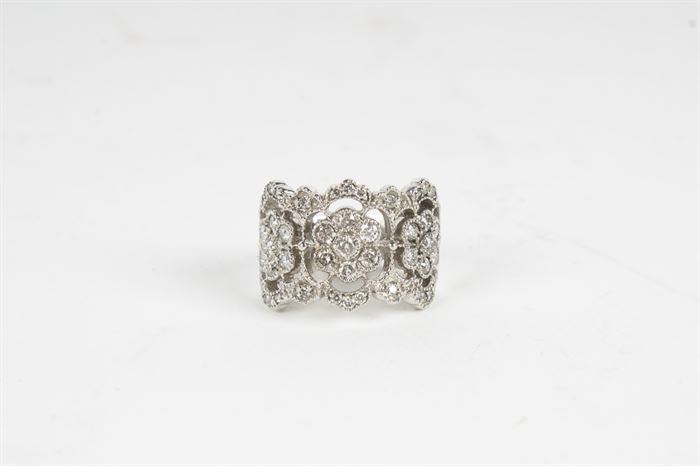 14K White Gold 1.04 CTW Diamond Floral Ring: A 14K white gold 1.04 ctw diamond flower ring.