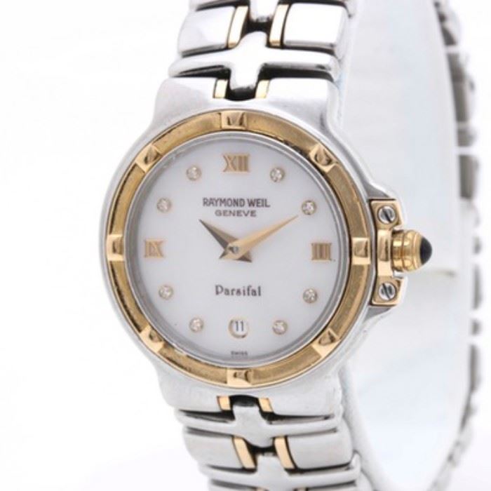 Raymond Weil Parsifal Diamond Wristwatch: A stainless steel Raymond Weil Parsifal diamond wristwatch. This wristwatch features a stainless steel case and bracelet links with gold wash accents. The face features eight bezel set diamonds arranged in a circular fashion.