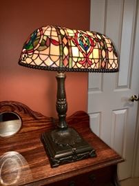 Tiffany-style and bronze table lamp
