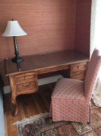‘Lorts” writing desk w/ upholstered	red chair	