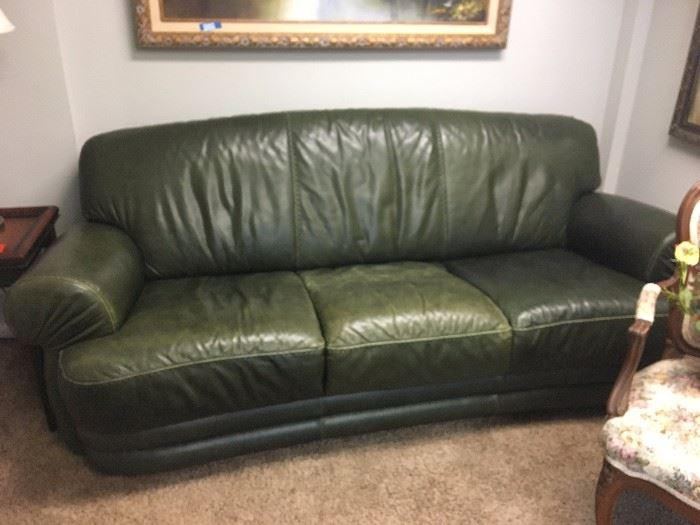 green leather sofa