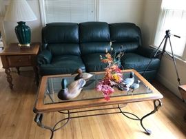 Green leather sofa, Ducks unlimited lamp table, Glass coffee table with swan neck legs