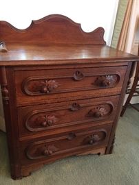 Antique wood chest with carved pulls