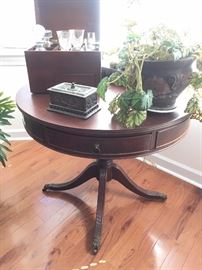 Antique leather top drum table