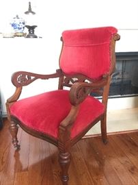 Unique antique side chair with red upholstery 